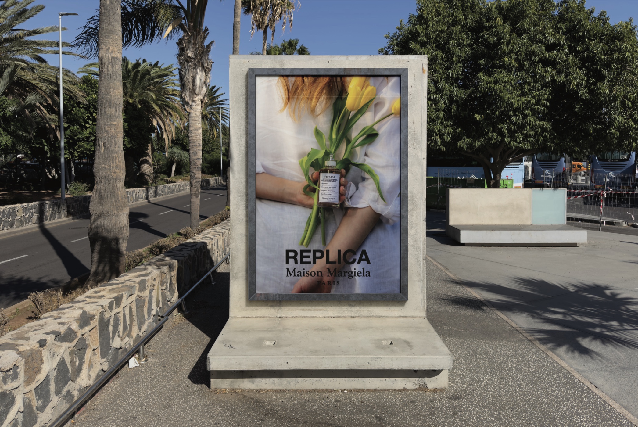 Out-of-home mockup — REPLICA street ad with the tulip portrait, sited on a sunlit promenade