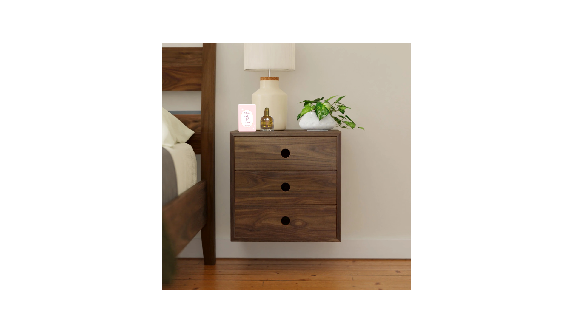 Bedside mockup — the box at home, in context